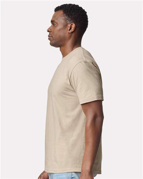 Gildan 3000 Sand — on model side