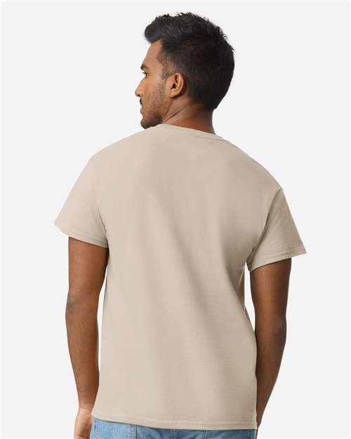 Gildan 2000 Sand — on model back