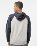 J. America 8885 Oatmeal Heather/ Vintage Navy Heather — on model back