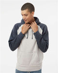 J. America 8885 Oatmeal Heather/ Vintage Navy Heather — on model front