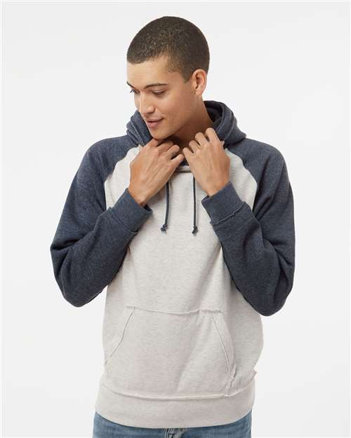 J. America 8885 Oatmeal Heather/ Vintage Navy Heather — on model front