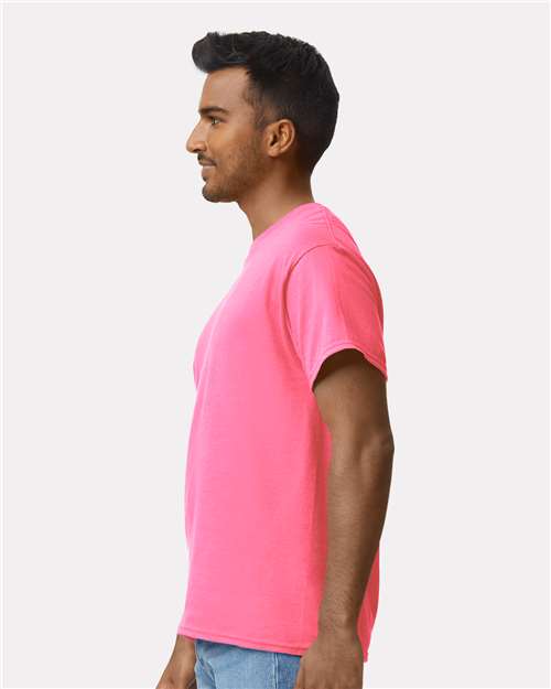 Gildan 2000 Safety Pink — on model side