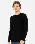 BELLA + CANVAS 3513 Solid Black Triblend — on model side